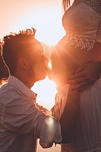 Man Kissing Woman's Belly thumbnail