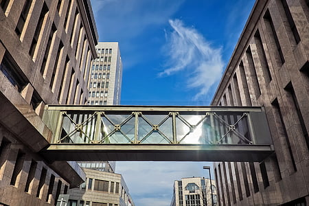 low-angle photo of brown buildings at daytime thumbnail
