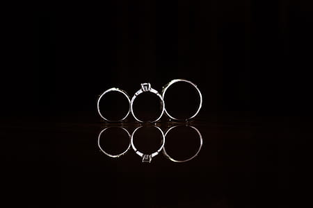 three silver-colored rings thumbnail