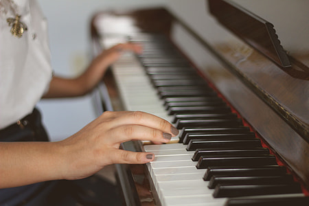 Closeup shot of a person playing the piano thumbnail