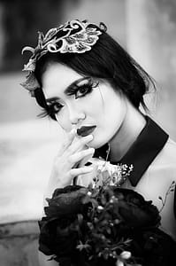 Grayscale Photo of Woman With Flowers thumbnail