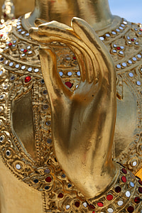 gold statue hand thumbnail