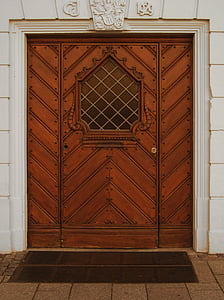 selective focus photo of brown wooden door thumbnail