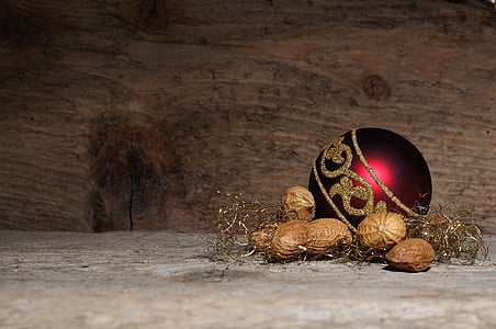 close-up photography of red bauble on gray surface thumbnail