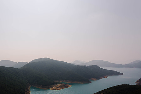 mountain beside body of water thumbnail
