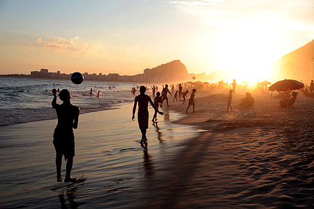 group of people on seashore during daytime thumbnail