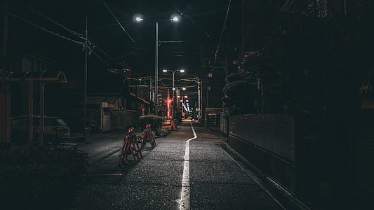 streetlight glowing on road thumbnail