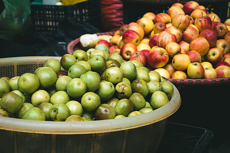 Small apples at a market thumbnail