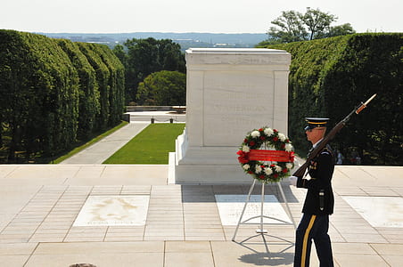 person standing near wreath thumbnail