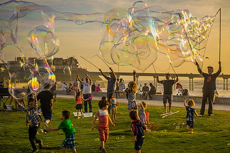 group of people playing with bubbles thumbnail