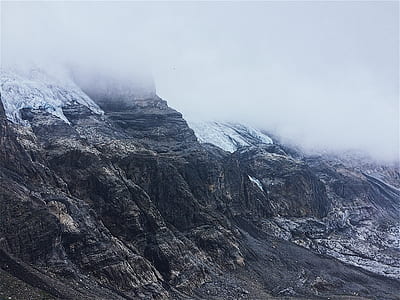 brown mountain covered by snow thumbnail