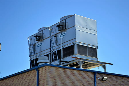 grey metal container on top of building roof thumbnail