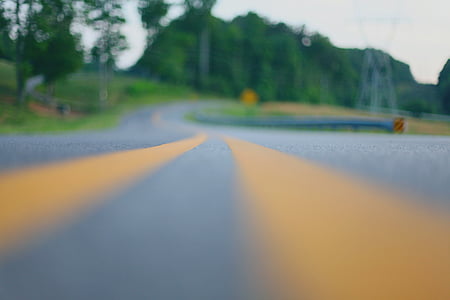 low-angle photography of winding road thumbnail