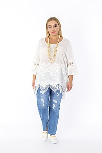 woman wearing white lace blouse standing thumbnail