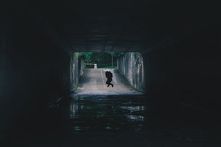 person jumping under tunnel thumbnail
