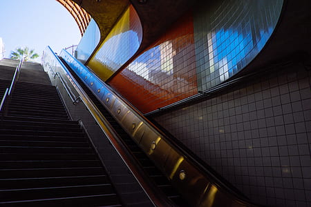multicolored tile wall near stair thumbnail