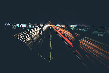 photo of high speed car lights during night time thumbnail