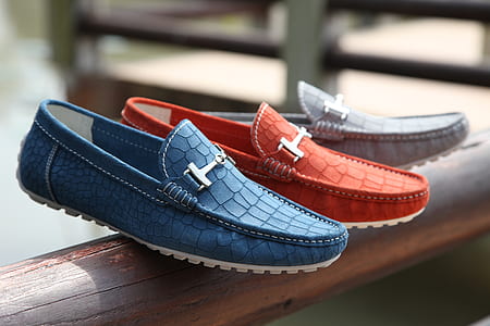 three unpaired men's boat shoes thumbnail