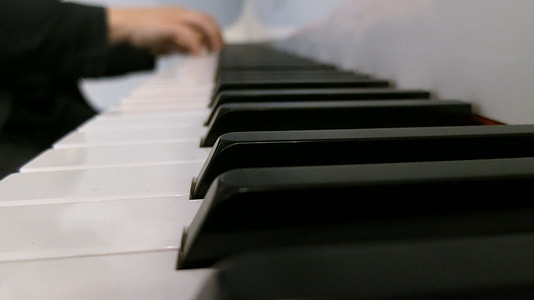 person playing piano thumbnail