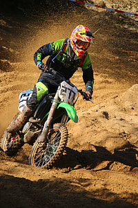 man riding motocross dirt bike thumbnail