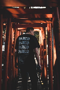 man holding black DSLR camera thumbnail
