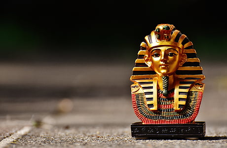 gold-colored paraoh figurine thumbnail
