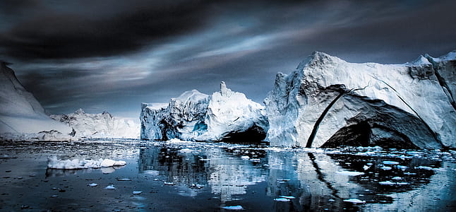 ice berg on body of water thumbnail