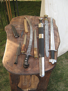 assorted swords on table thumbnail