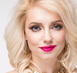 woman in pink lipstick closeup photography thumbnail