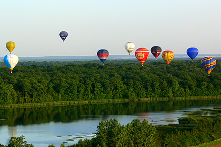 hot air balloons hovering on sky thumbnail