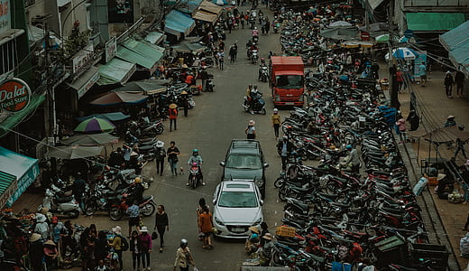Group of People Walking Through Market thumbnail