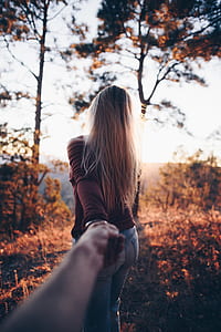 woman holding hand watching tree thumbnail