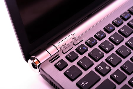 pink and black laptop computer thumbnail