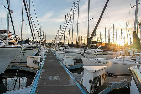white yacht parked near the dock thumbnail