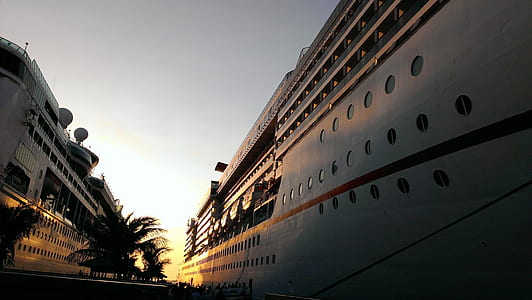white cruise ship during golden hour thumbnail