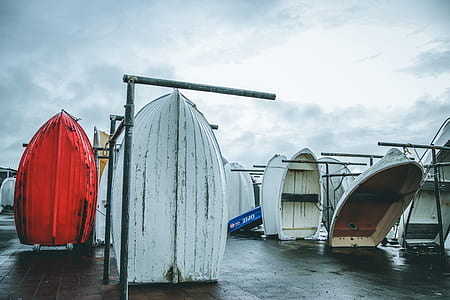 assorted boats standing near pier thumbnail