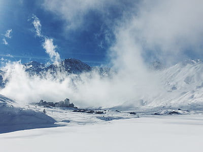 mountain range near snow field thumbnail