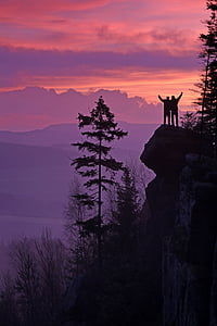 two person standing at the mountains thumbnail