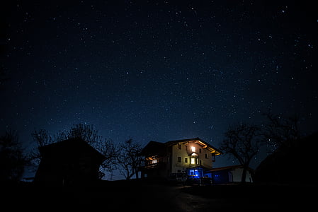 house near trees with light thumbnail