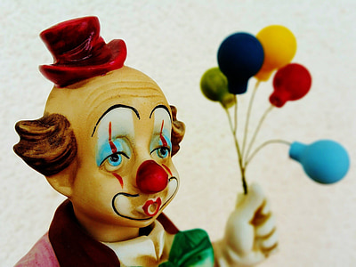 clown holding balloons figurine thumbnail