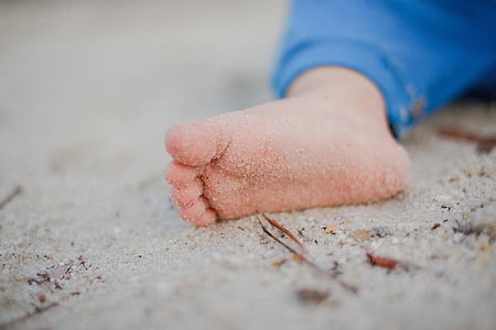selective focus photography of child foot thumbnail