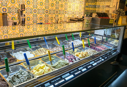 clear glass display shelf with assorted ice cream inside thumbnail