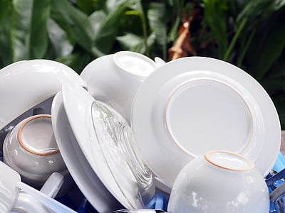 pile of white ceramic plates thumbnail