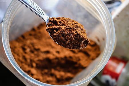 Shallow Focus Photography of Brown Powder on Stainless Steel Tea Spoon thumbnail