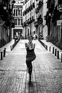 grayscale photography of woman in yoga position thumbnail