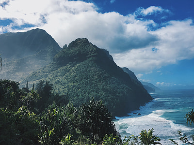 seashore near mountain thumbnail