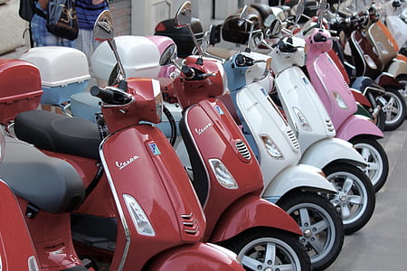 scooters parked along the street thumbnail