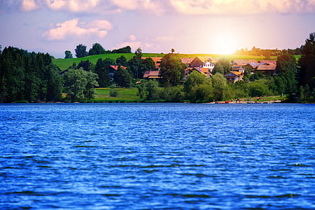 body of water beside suburban household thumbnail