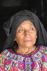 woman with black scarf on head thumbnail
