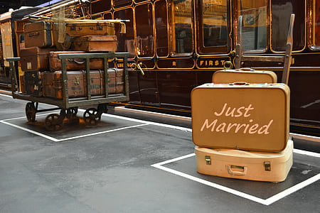white luggage near carriage thumbnail